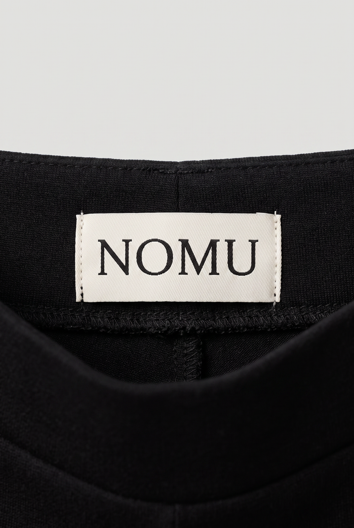 NOMU-AI label