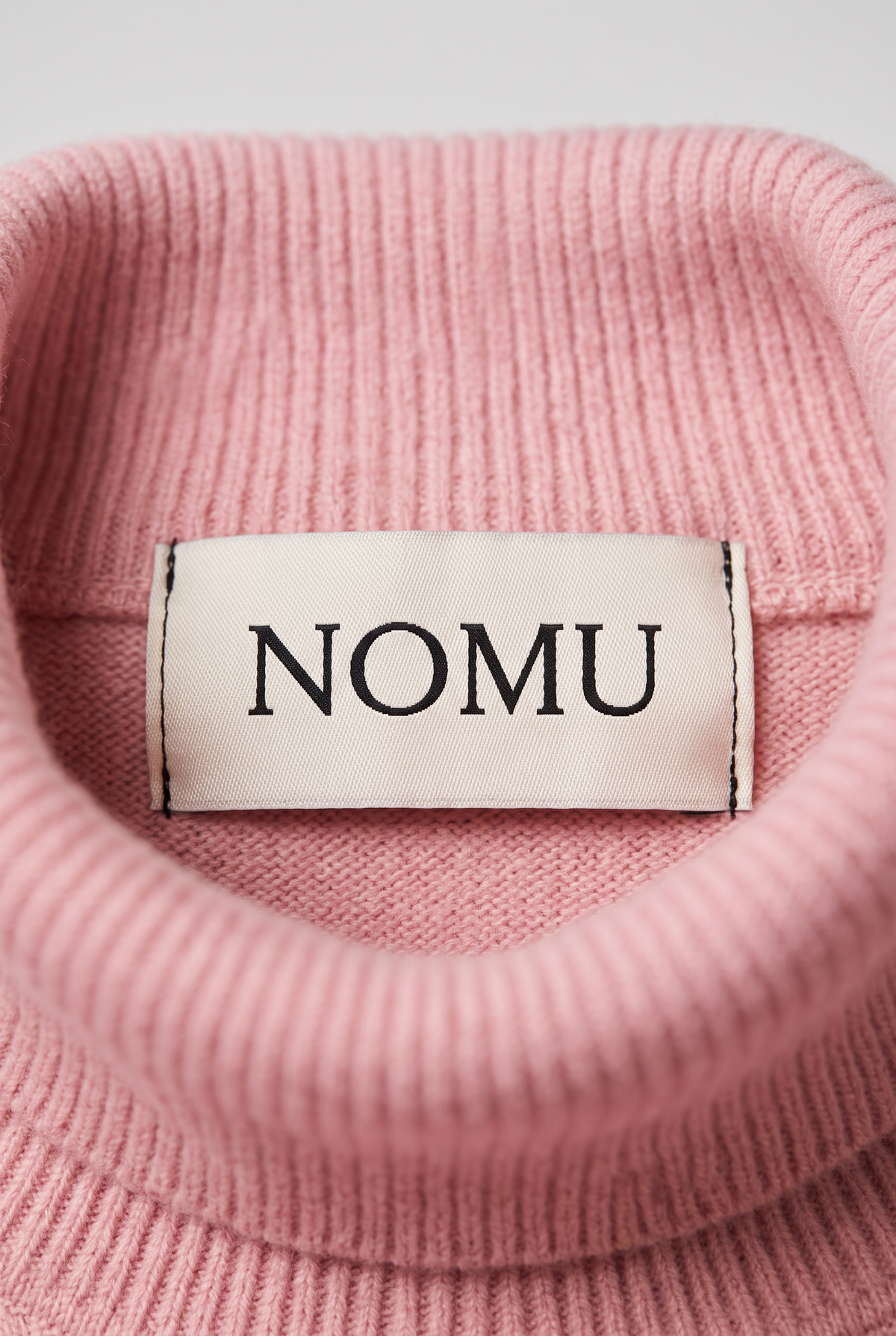 NOMU-AI label