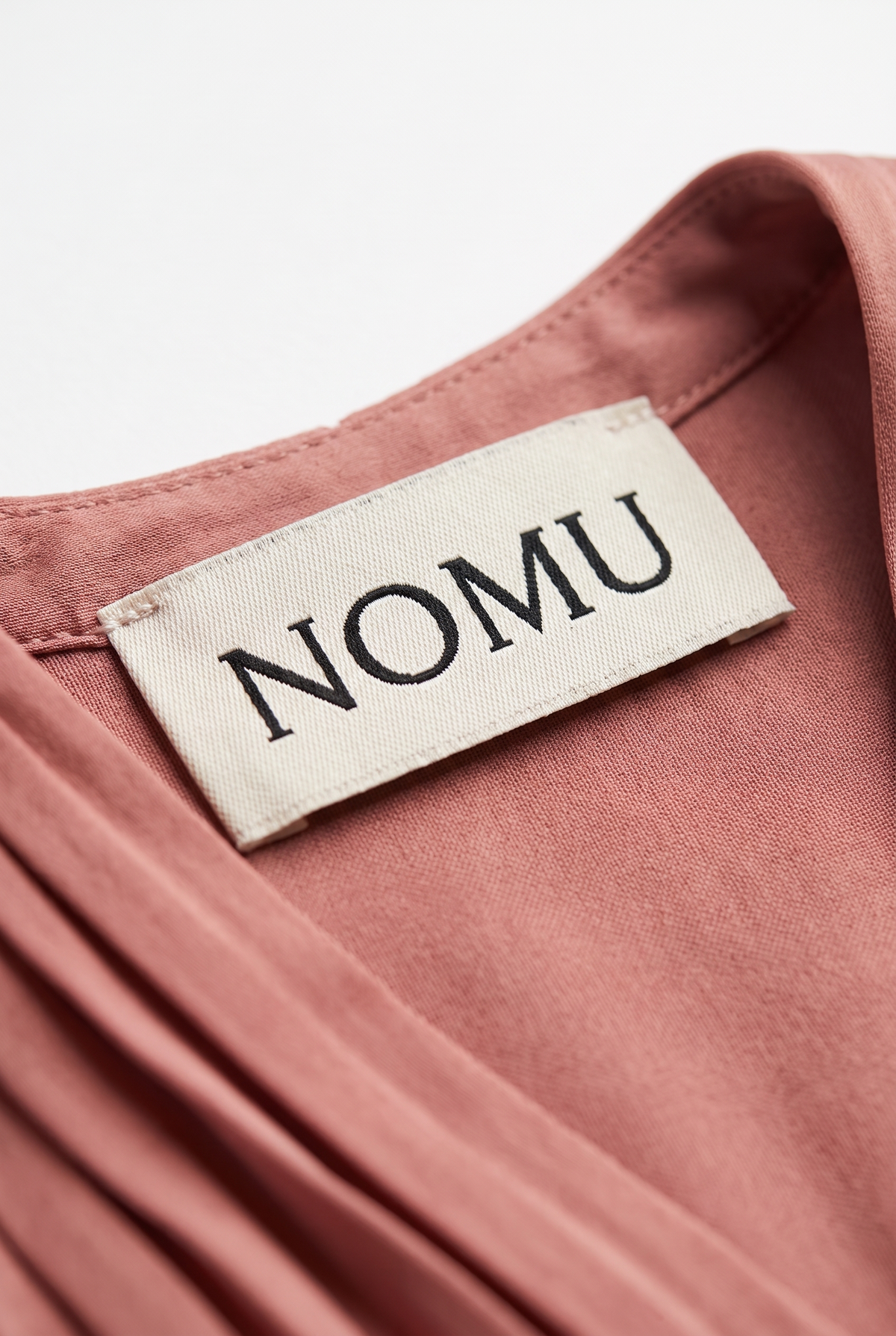 NOMU-AI label