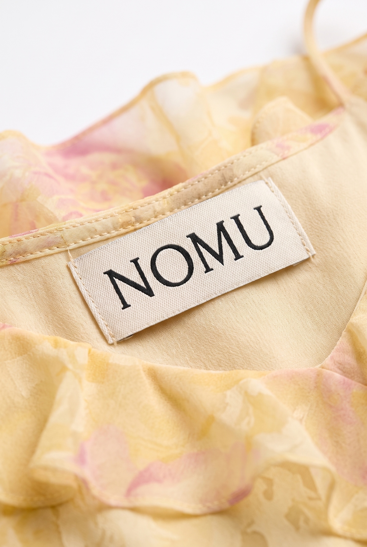 NOMU-AI label
