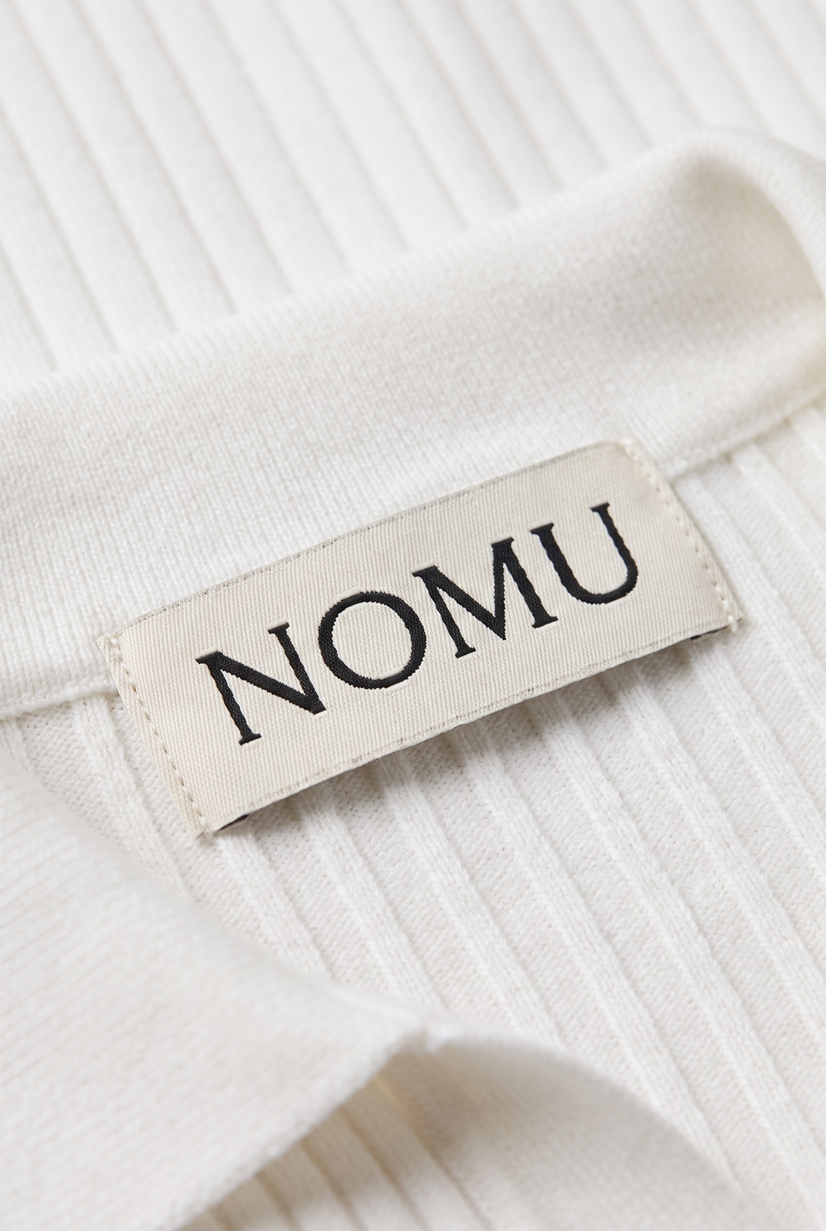 NOMU-AI label