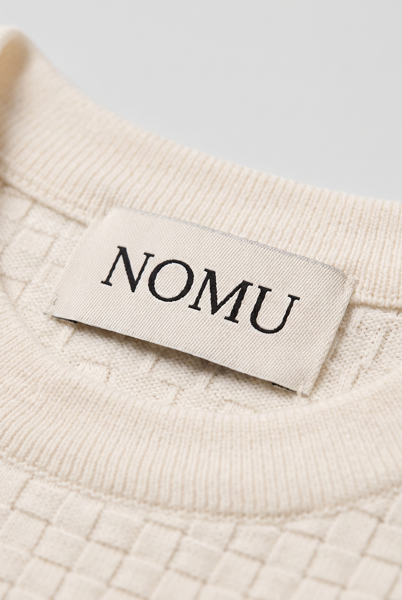 NOMU-AI label